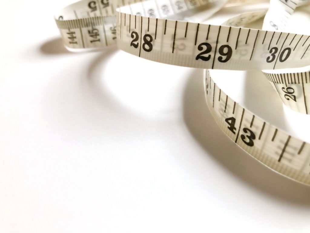 Measure tape for weight loss concept